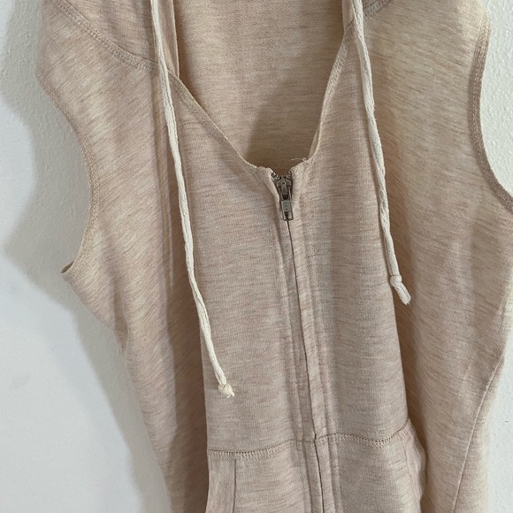 Maurices Other - Tan beach cover up with design on hoodie and zipper to close